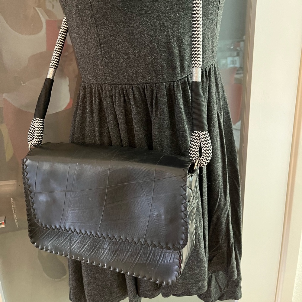 Custom designed purse made in South Africa of recycled tires with fabric lining
